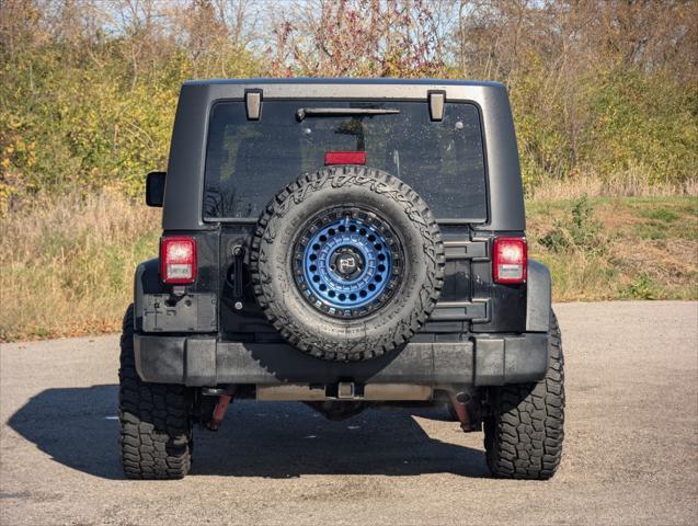 used 2018 Jeep Wrangler JK car, priced at $27,551