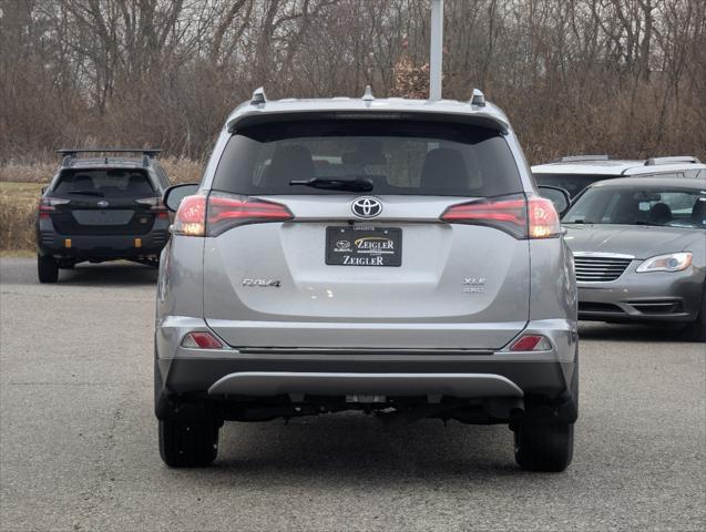 used 2018 Toyota RAV4 car, priced at $18,540