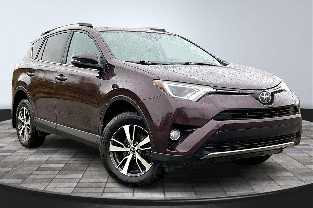 used 2018 Toyota RAV4 car, priced at $12,799