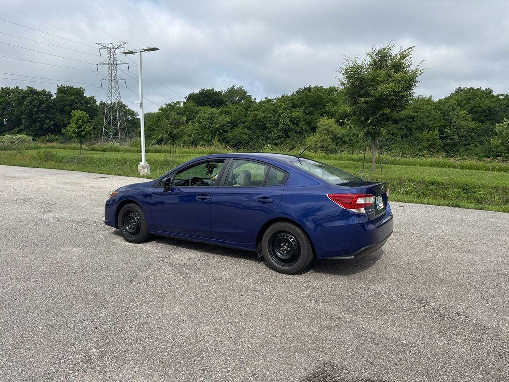 used 2023 Subaru Impreza car, priced at $17,750