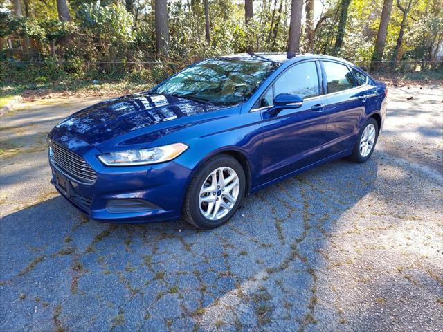 used 2014 Ford Fusion car, priced at $7,395