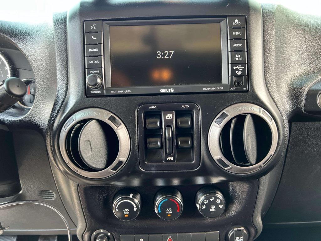 used 2015 Jeep Wrangler Unlimited car, priced at $18,784