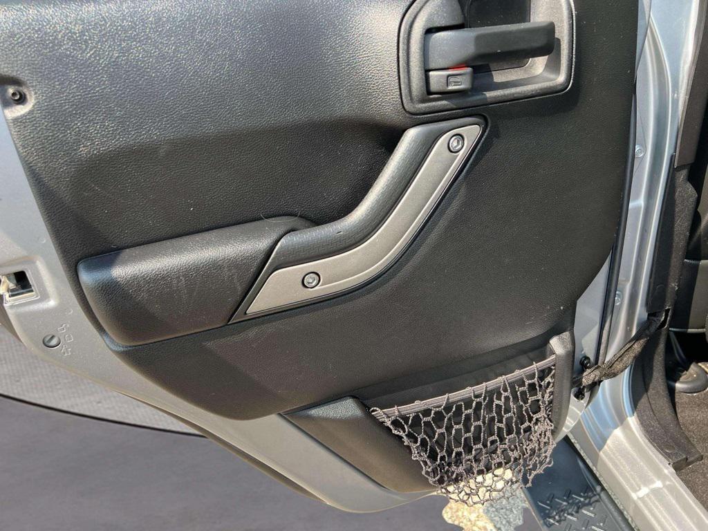 used 2015 Jeep Wrangler Unlimited car, priced at $18,784