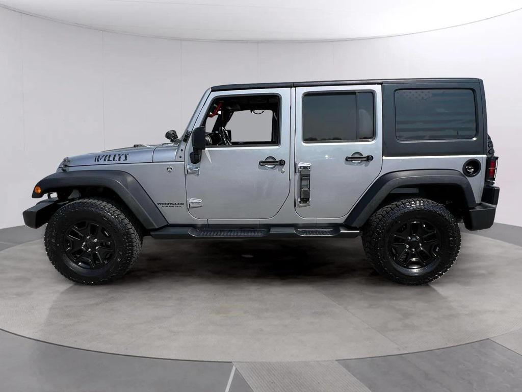 used 2015 Jeep Wrangler Unlimited car, priced at $18,784