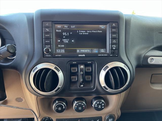 used 2016 Jeep Wrangler Unlimited car, priced at $15,551