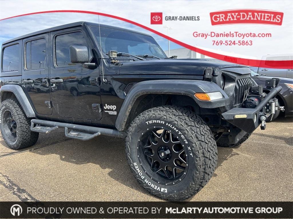 used 2018 Jeep Wrangler Unlimited car, priced at $23,177