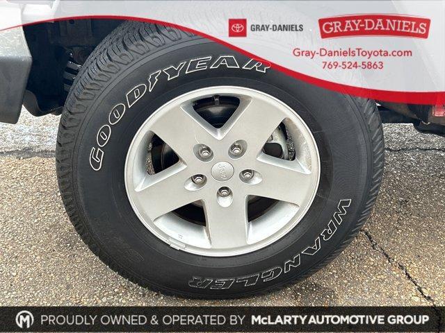 used 2011 Jeep Wrangler Unlimited car, priced at $13,903