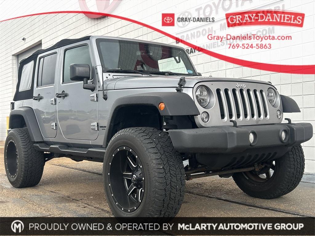 used 2016 Jeep Wrangler Unlimited car, priced at $20,488