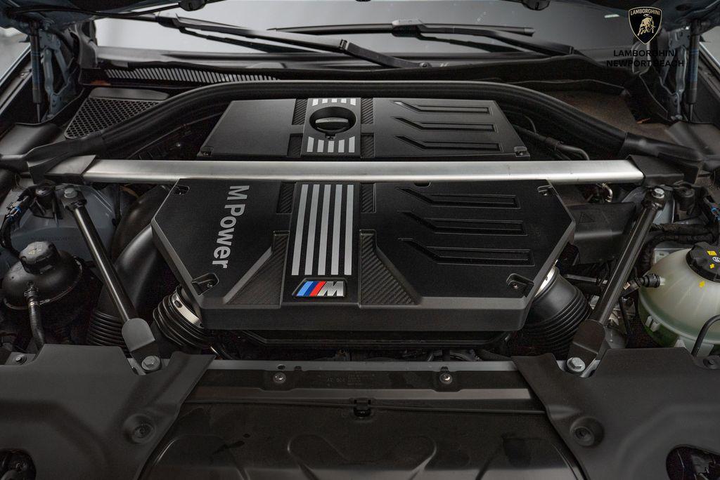 used 2025 BMW X4 M car, priced at $79,998