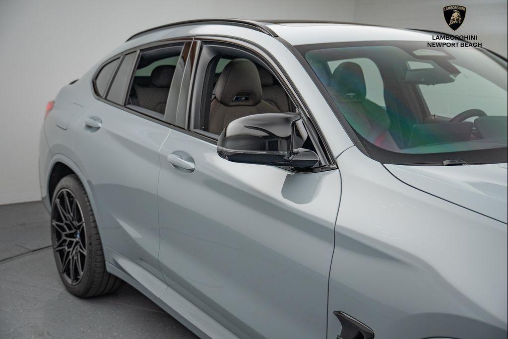 used 2025 BMW X4 M car, priced at $79,998