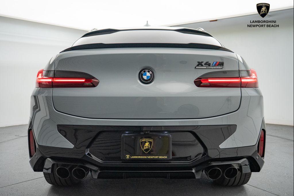 used 2025 BMW X4 M car, priced at $79,998