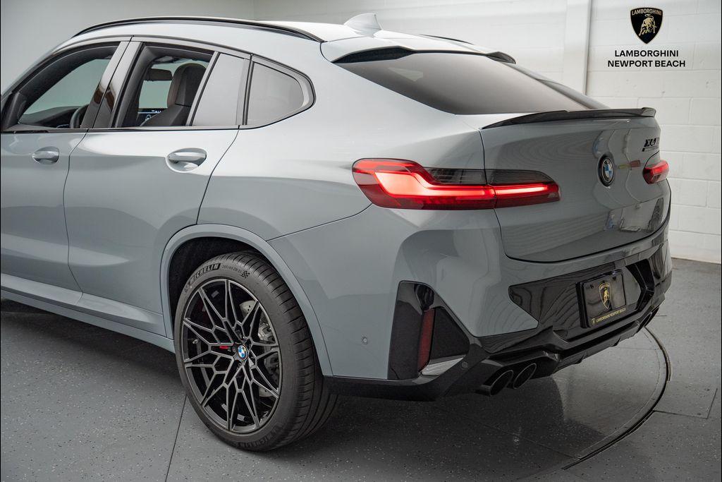 used 2025 BMW X4 M car, priced at $79,998