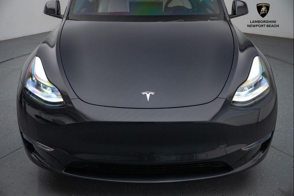 used 2024 Tesla Model Y car, priced at $38,608