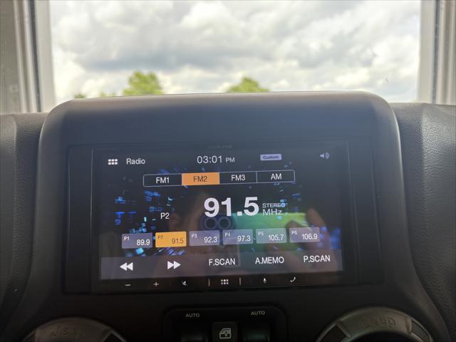 used 2016 Jeep Wrangler Unlimited car, priced at $18,488