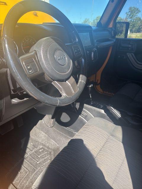 used 2012 Jeep Wrangler Unlimited car, priced at $13,411