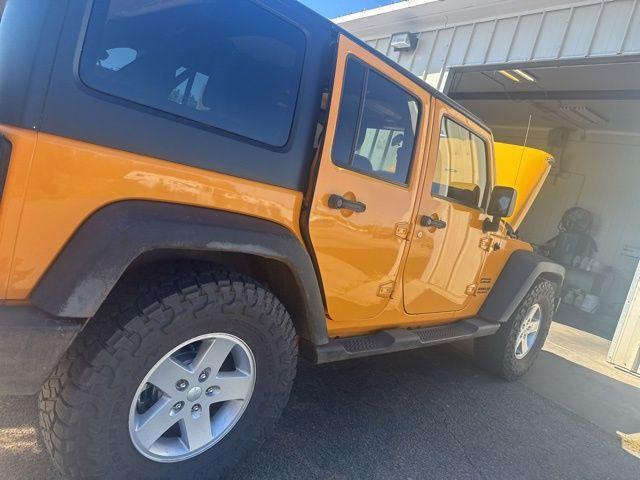 used 2012 Jeep Wrangler Unlimited car, priced at $13,411