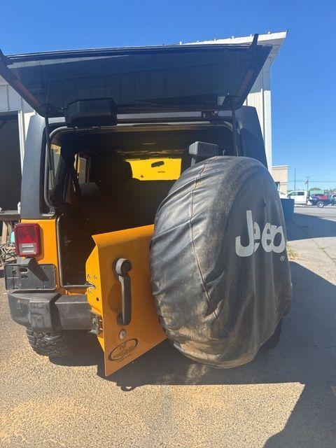used 2012 Jeep Wrangler Unlimited car, priced at $13,411