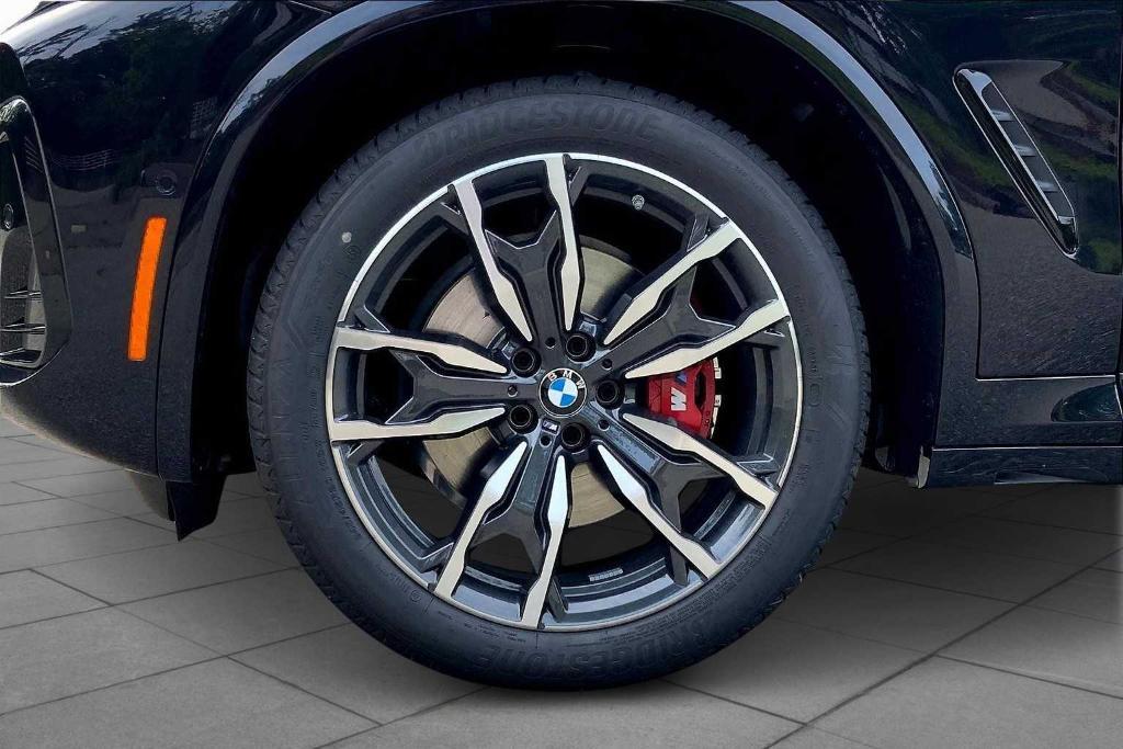 new 2025 BMW X4 car, priced at $75,570