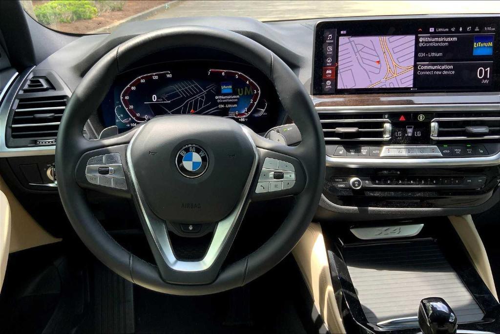 used 2025 BMW X4 car, priced at $53,870