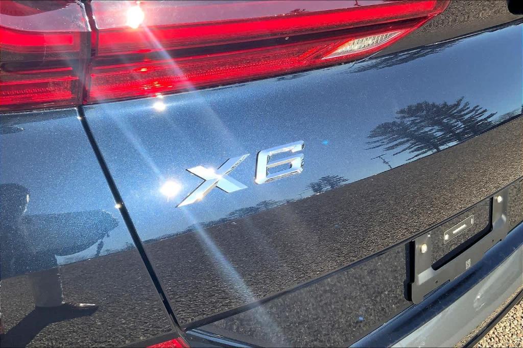 used 2025 BMW X6 car, priced at $77,598