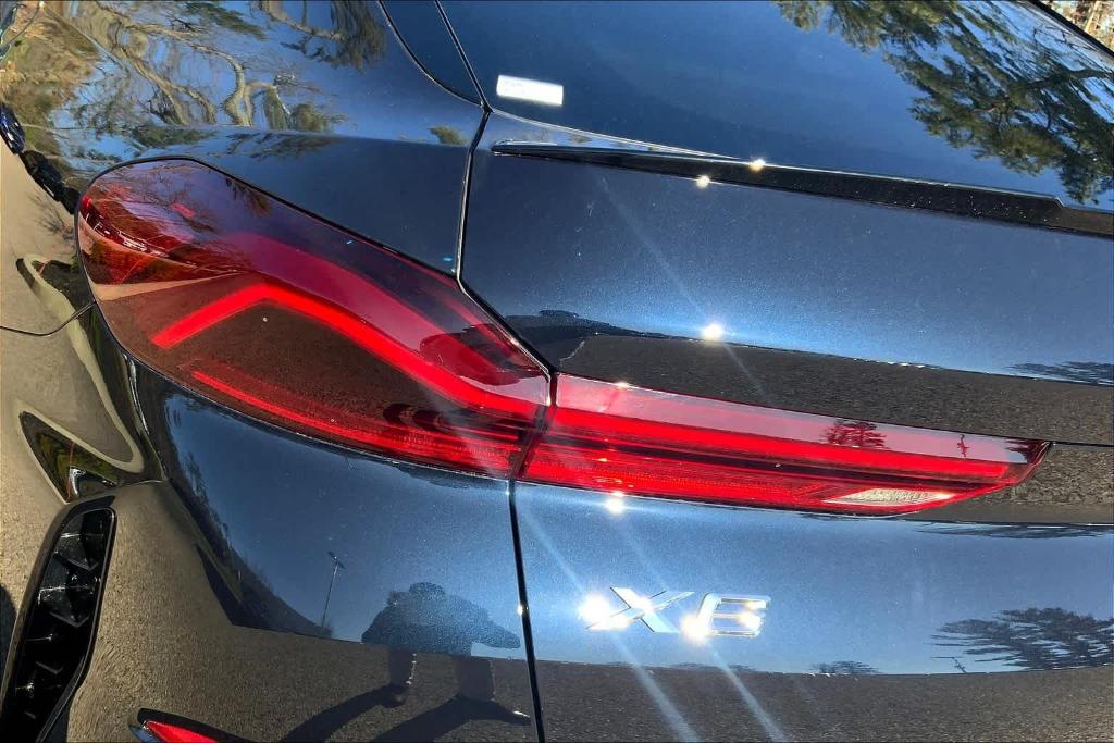 used 2025 BMW X6 car, priced at $77,598