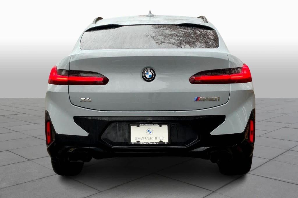used 2023 BMW X4 car, priced at $50,892