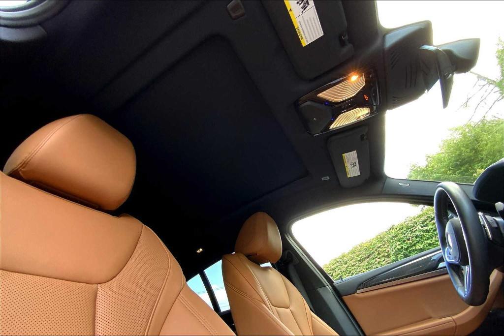 used 2023 BMW X4 car, priced at $57,573