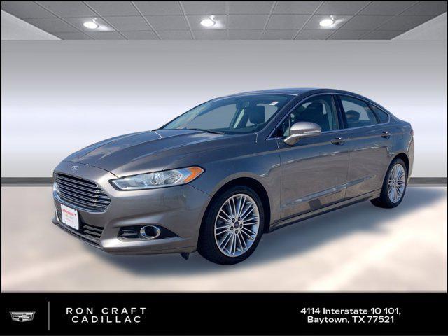 used 2014 Ford Fusion car, priced at $6,999