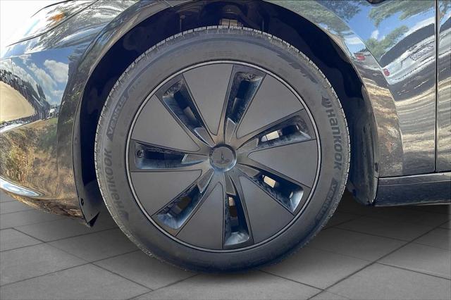 used 2025 Tesla Model 3 car, priced at $38,064