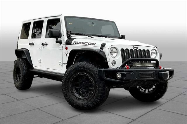 used 2015 Jeep Wrangler Unlimited car, priced at $21,263