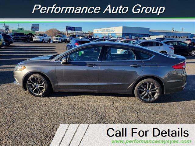 used 2018 Ford Fusion car, priced at $13,999