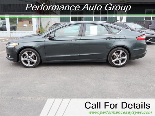 used 2015 Ford Fusion car, priced at $9,999