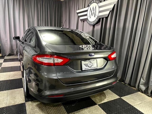 used 2016 Ford Fusion Hybrid car, priced at $11,992