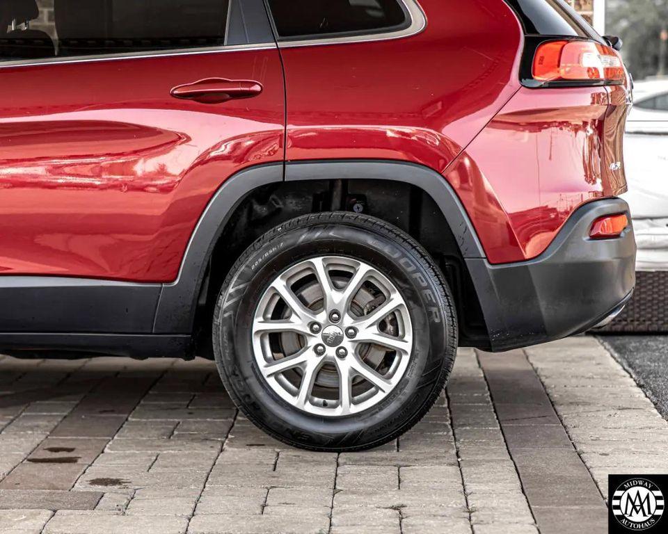 used 2014 Jeep Cherokee car, priced at $10,995