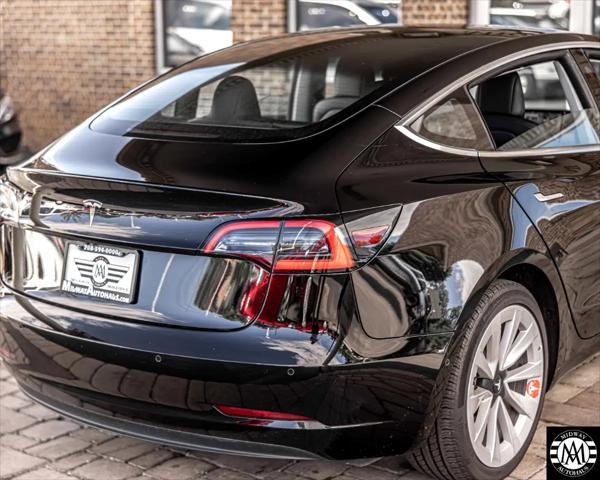 used 2018 Tesla Model 3 car, priced at $22,995