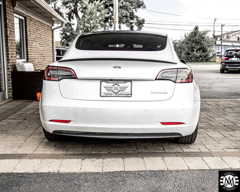 used 2021 Tesla Model 3 car, priced at $25,495