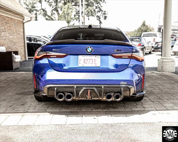 used 2024 BMW M4 car, priced at $79,995