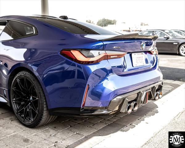 used 2024 BMW M4 car, priced at $79,995