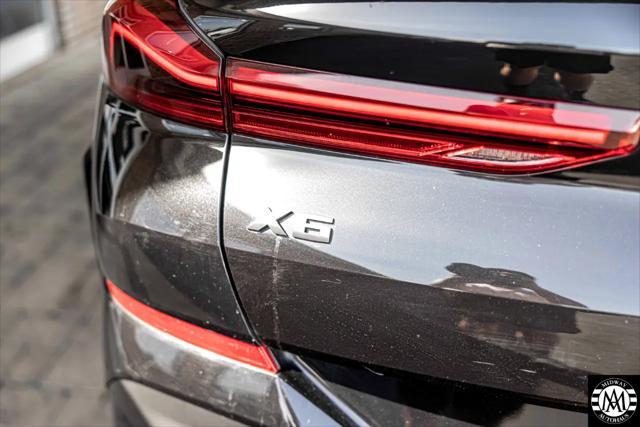 used 2022 BMW X6 car, priced at $49,995