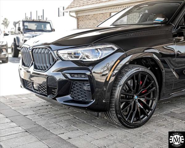 used 2022 BMW X6 car, priced at $49,995