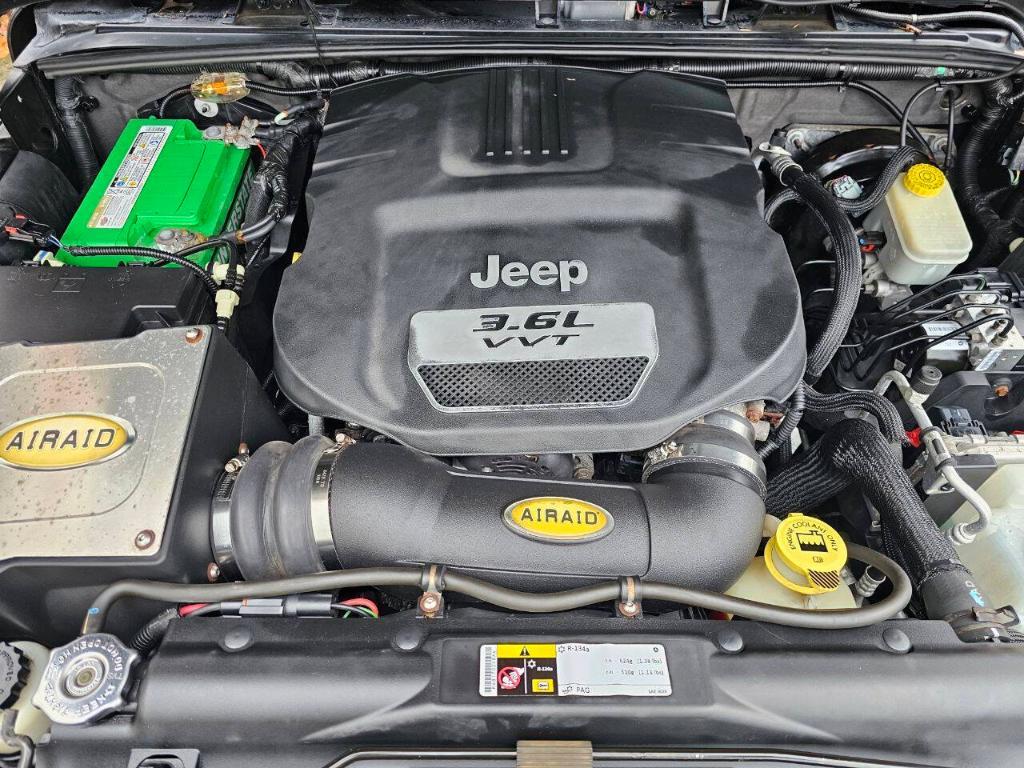 used 2012 Jeep Wrangler Unlimited car, priced at $11,995