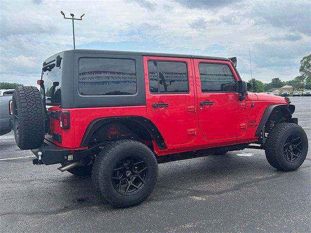 used 2018 Jeep Wrangler JK Unlimited car, priced at $23,921