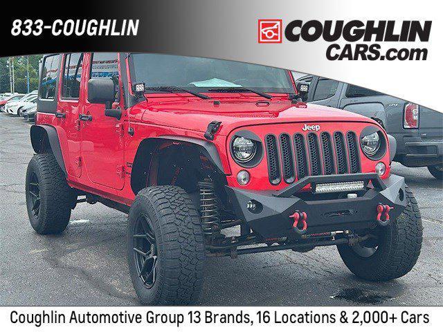 used 2018 Jeep Wrangler JK Unlimited car, priced at $23,921