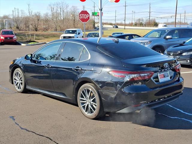 used 2022 Toyota Camry Hybrid car, priced at $28,777