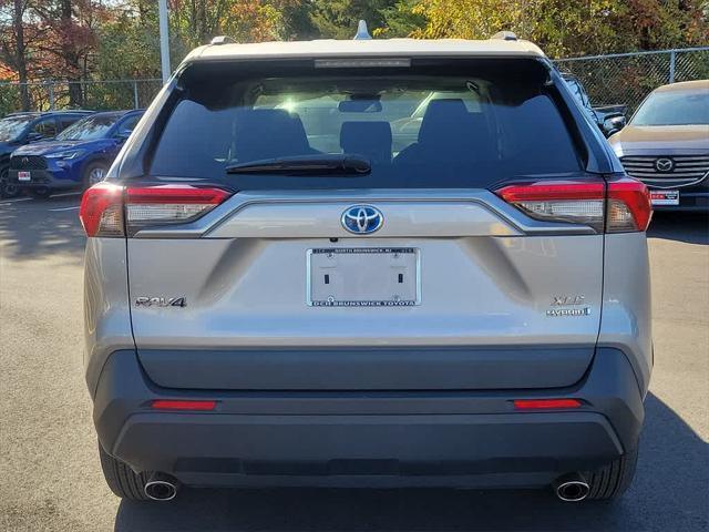 used 2021 Toyota RAV4 Hybrid car, priced at $27,495