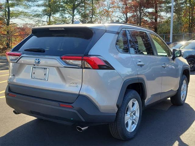 used 2021 Toyota RAV4 Hybrid car, priced at $27,495