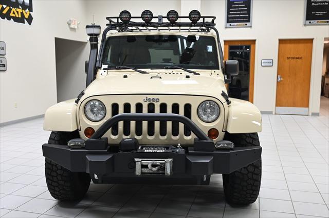 used 2011 Jeep Wrangler Unlimited car, priced at $17,599