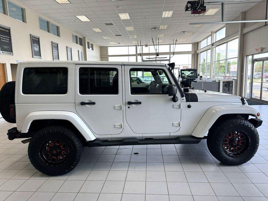 used 2013 Jeep Wrangler Unlimited car, priced at $22,377