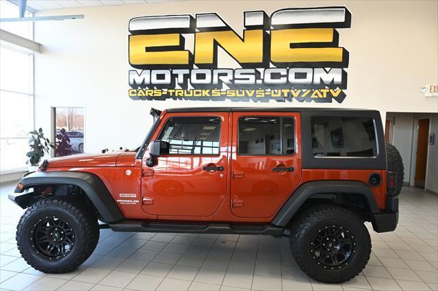 used 2014 Jeep Wrangler Unlimited car, priced at $20,999