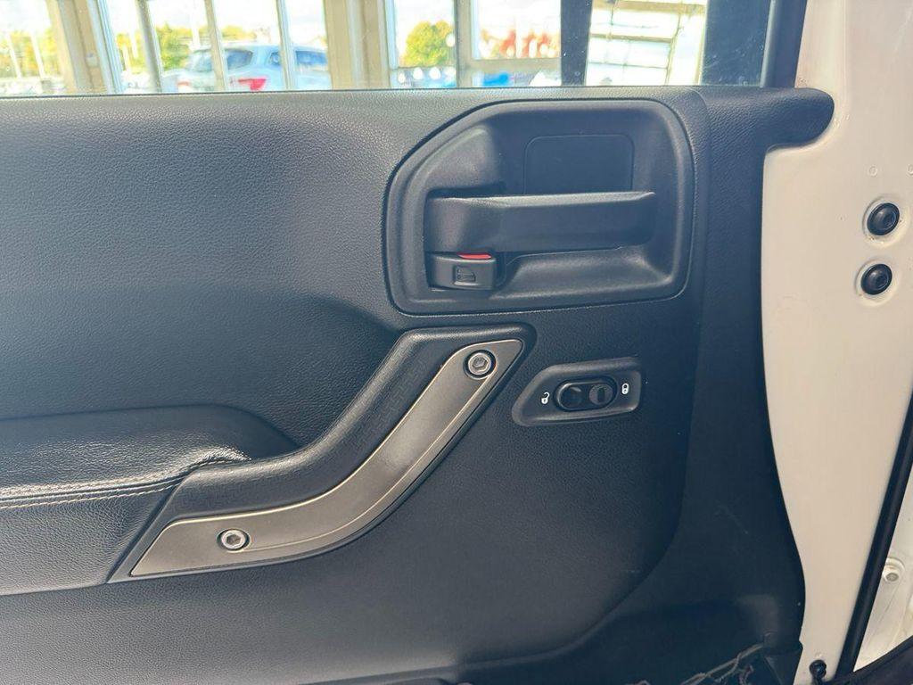 used 2018 Jeep Wrangler JK Unlimited car, priced at $19,999